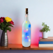Load image into Gallery viewer, frosted wine bottle with colored fairy lights inside