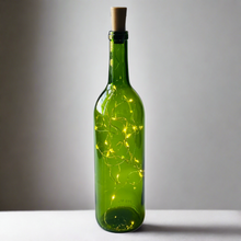 Load image into Gallery viewer, green wine bottle with white fairy lights inside