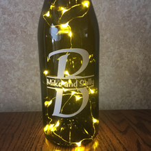 Load image into Gallery viewer, Custom Vinyl Split Monogram Wine Bottle With or Without Twinkle Fairy Lights Powered From Cork