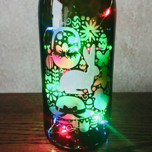 Load image into Gallery viewer, Hoppy Easter Etched Egg Wine Bottle With Twinkle Fairy Lights Powered From Cork